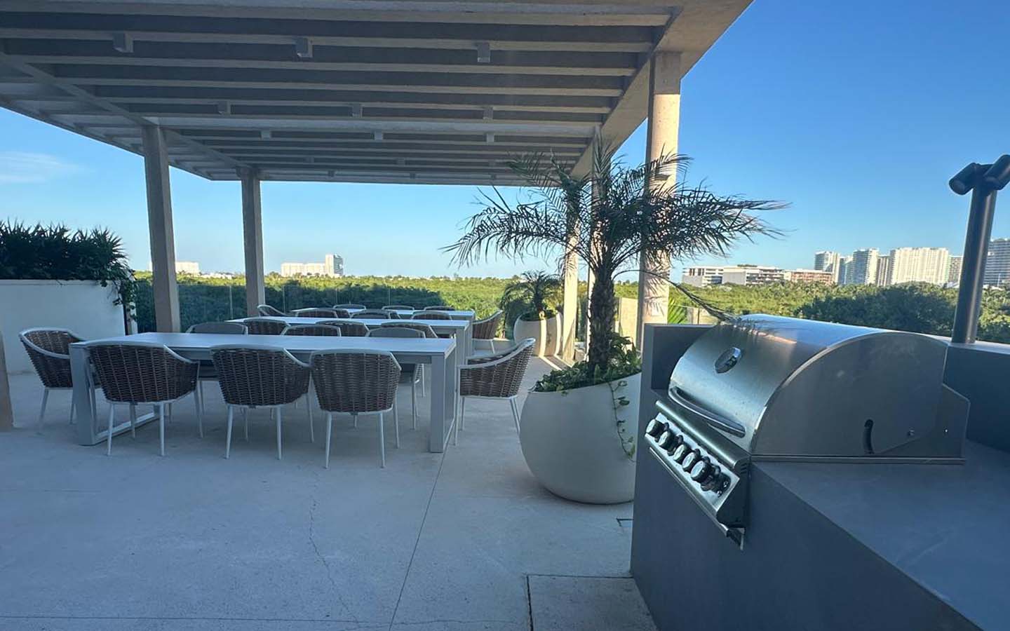 woha-departamento-renta-puerto-cancun-area-de-asador