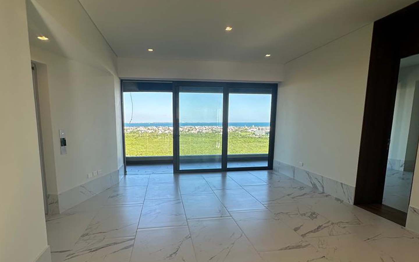 woha-departamento-renta-puerto-cancun-area-de-sala